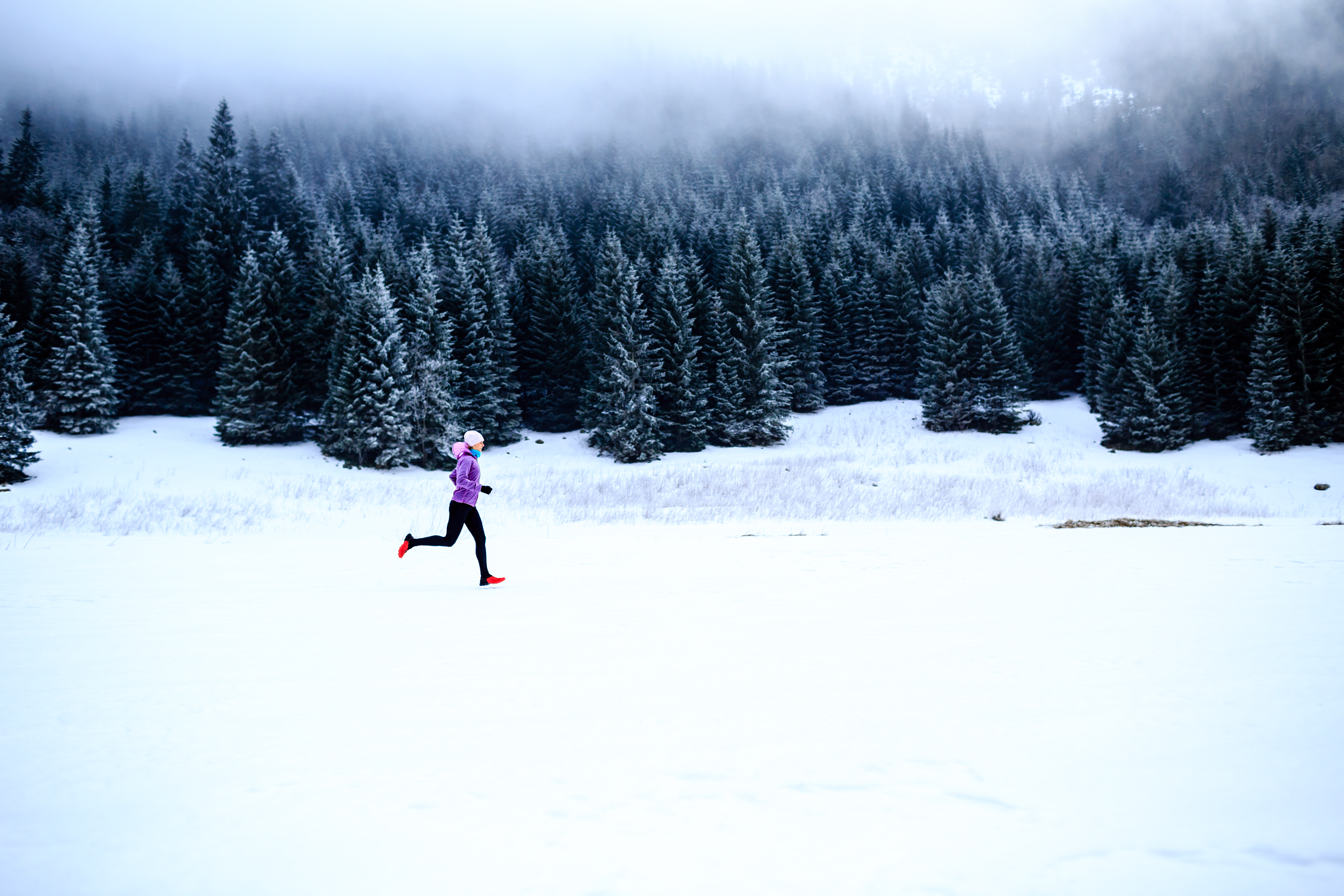 Running inspiration and motivation, runner in the snow